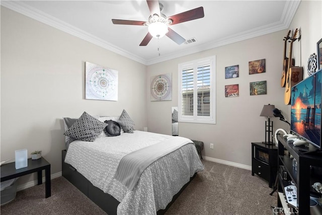 bedroom with baseboards, visible vents, dark colored carpet, and ornamental molding