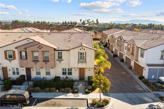 bird's eye view with a residential view and a mountain view