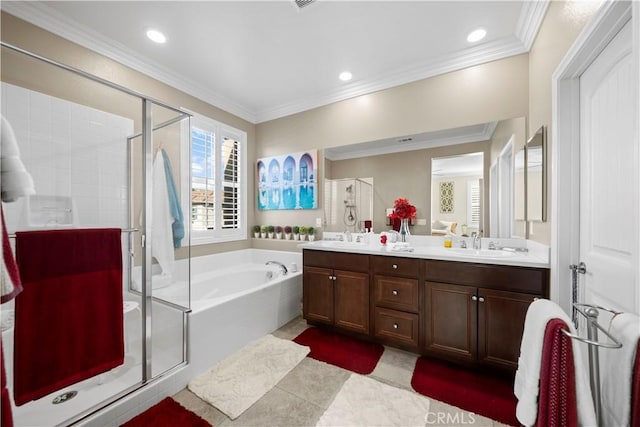 bathroom with a garden tub, a sink, a shower stall, and double vanity