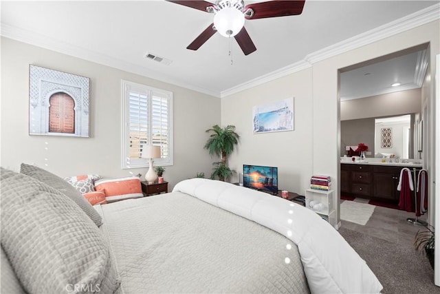 bedroom with ensuite bathroom, ceiling fan, carpet floors, visible vents, and ornamental molding