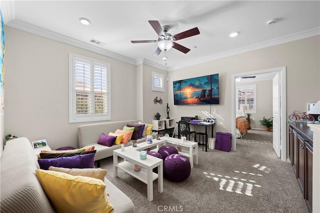 carpeted living room featuring ornamental molding, recessed lighting, visible vents, and ceiling fan