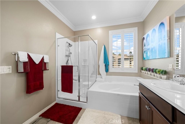 bathroom featuring a garden tub, vanity, baseboards, ornamental molding, and a stall shower