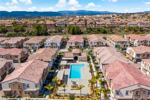 bird's eye view featuring a residential view and a mountain view