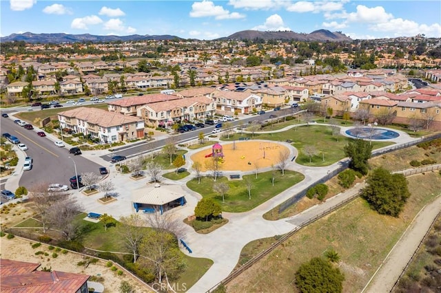 drone / aerial view featuring a mountain view and a residential view