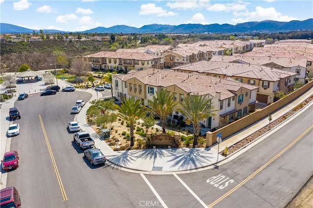 birds eye view of property featuring a residential view and a mountain view