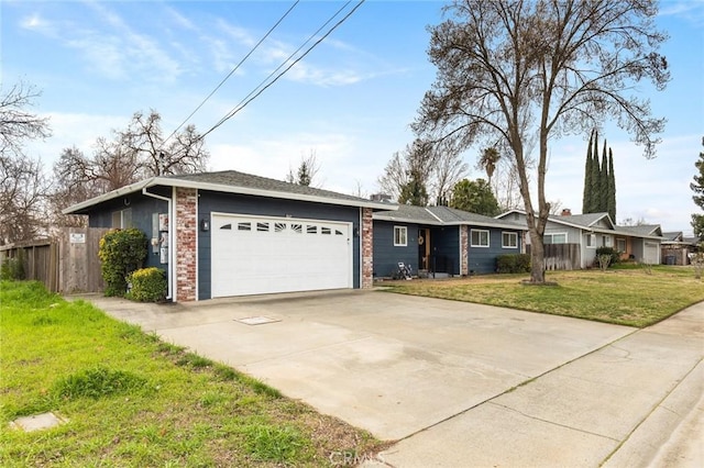 single story home featuring a garage, brick siding, concrete driveway, and a front yard