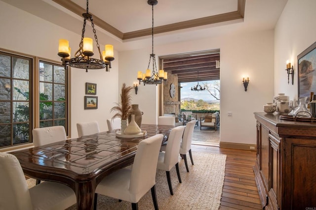 5423 Calzada Del Bosque, Rancho Santa Fe, CA 92067 - dining space featuring a chandelier, hardwood / wood-style flooring, and a raised ceiling