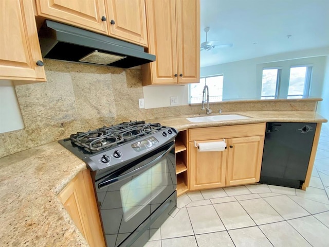 kitchen with a sink, light brown cabinets, under cabinet range hood, and black appliances