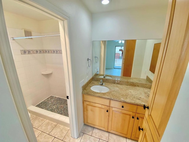 full bathroom featuring tile patterned floors, vanity, recessed lighting, and a stall shower