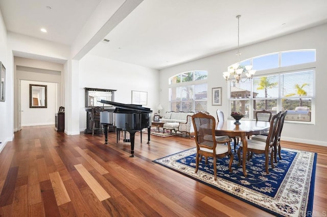 dining area featuring baseboards, visible vents, dark wood-type flooring, a chandelier, and recessed lighting