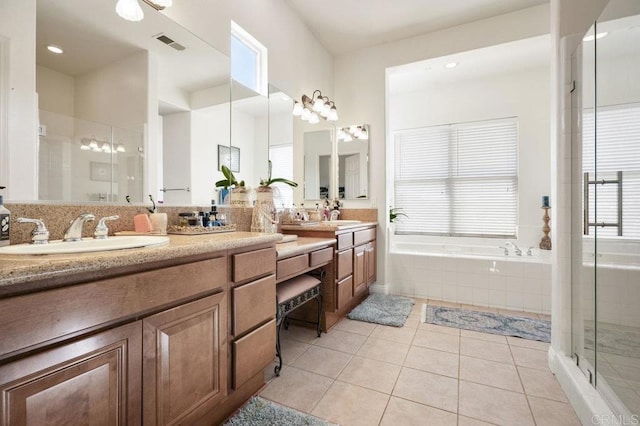 bathroom with a garden tub, visible vents, a stall shower, vanity, and tile patterned flooring