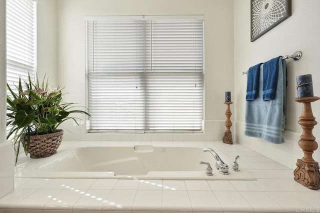 bathroom featuring tiled tub