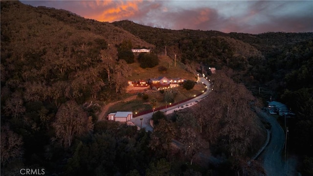 aerial view at dusk with a mountain view