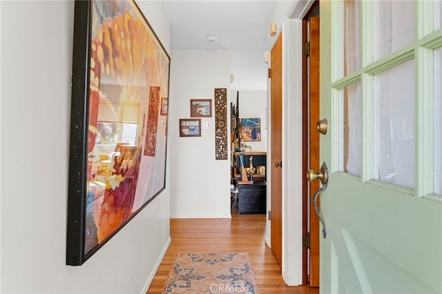 hall featuring light wood-style flooring