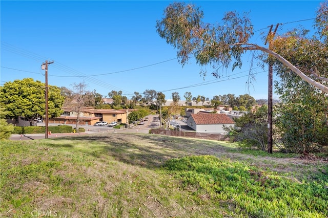 view of yard featuring a residential view