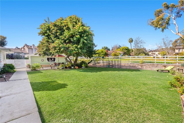 view of yard with fence