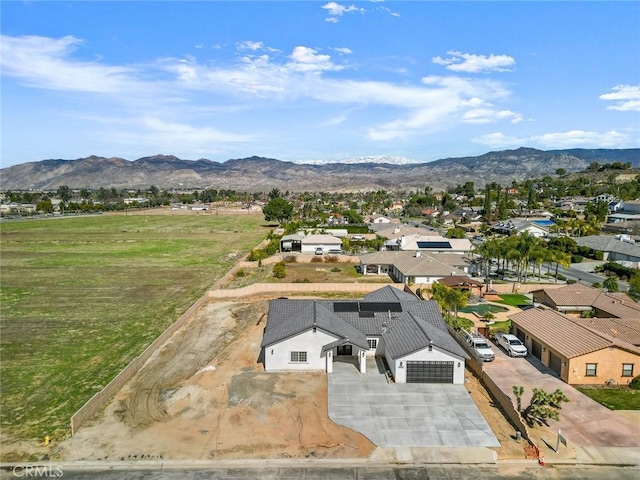 birds eye view of property featuring a residential view and a mountain view