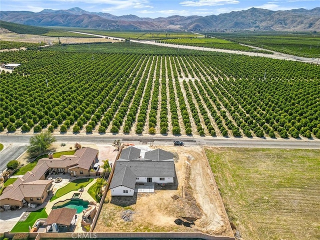 aerial view featuring a rural view and a mountain view