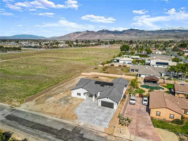 aerial view with a residential view and a mountain view