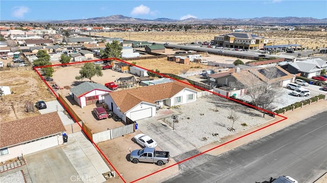 aerial view with a residential view and a mountain view