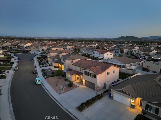 aerial view featuring a mountain view and a residential view