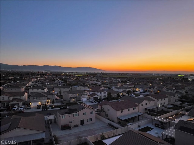 property's view of city with a residential view and a mountain view