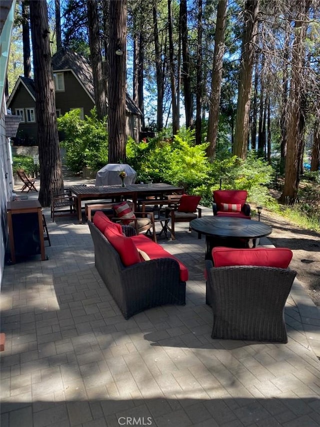 view of patio / terrace with outdoor dining space and area for grilling