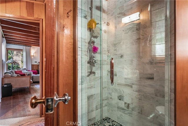 bathroom featuring a shower stall