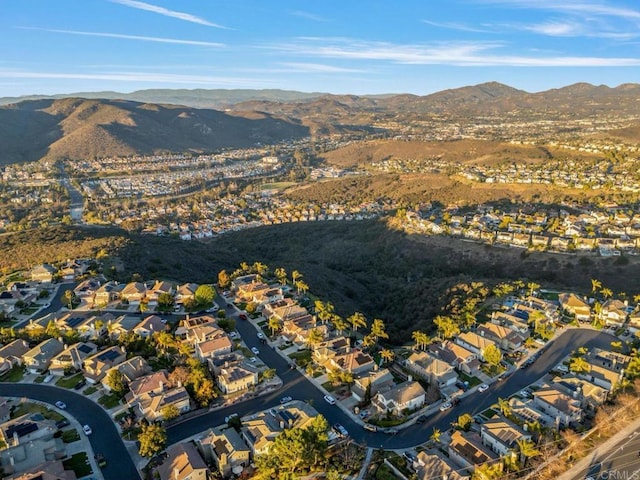 drone / aerial view with a residential view and a mountain view