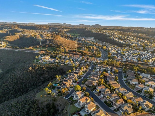 drone / aerial view with a residential view and a mountain view