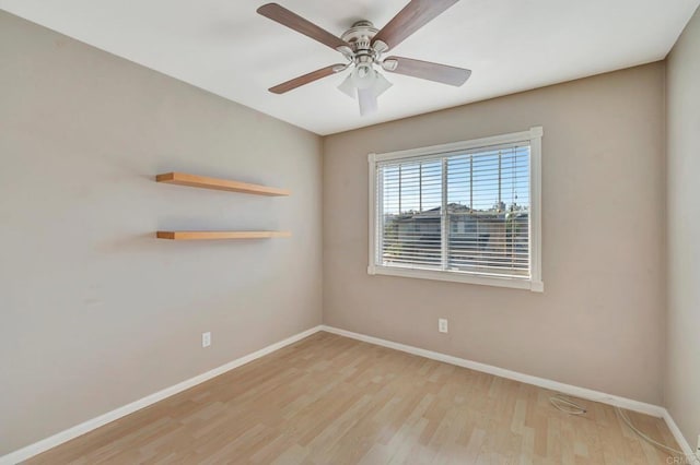 unfurnished room with light wood-style flooring, baseboards, and ceiling fan