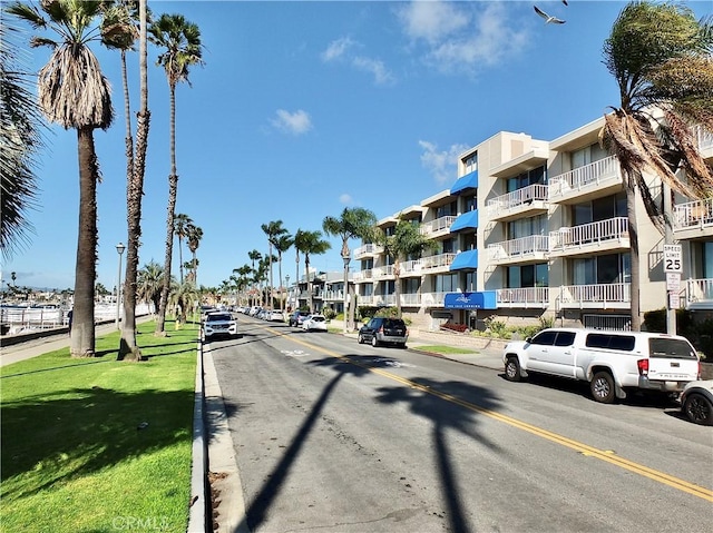 view of street featuring curbs and sidewalks