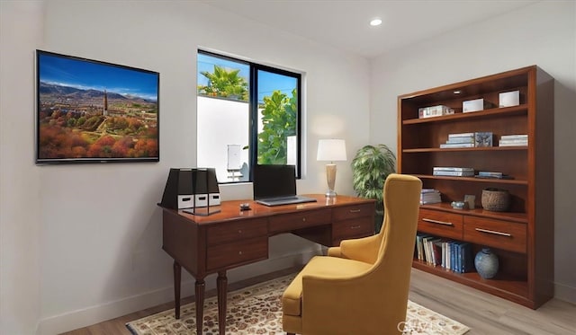 office with light wood-style flooring, baseboards, and recessed lighting