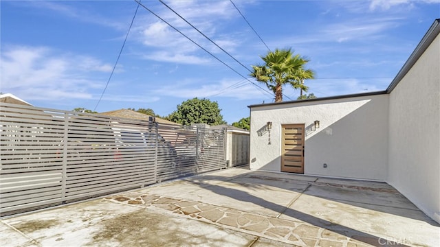 view of patio with fence