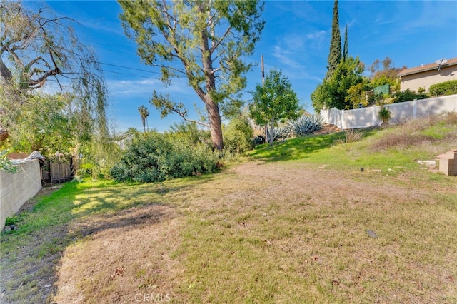 view of yard with fence