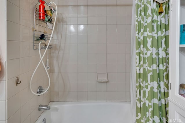 full bathroom with shower / bath combination with curtain