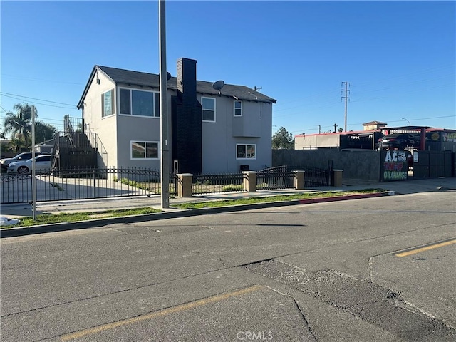 exterior space with curbs and sidewalks