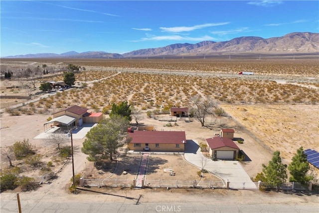 bird's eye view with a mountain view and view of desert