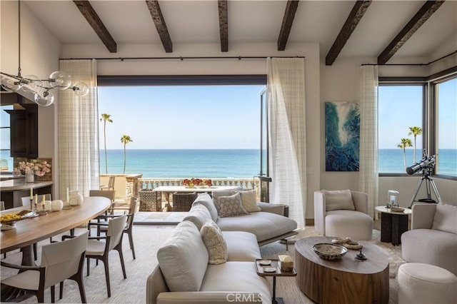 living room with a wealth of natural light and a water view