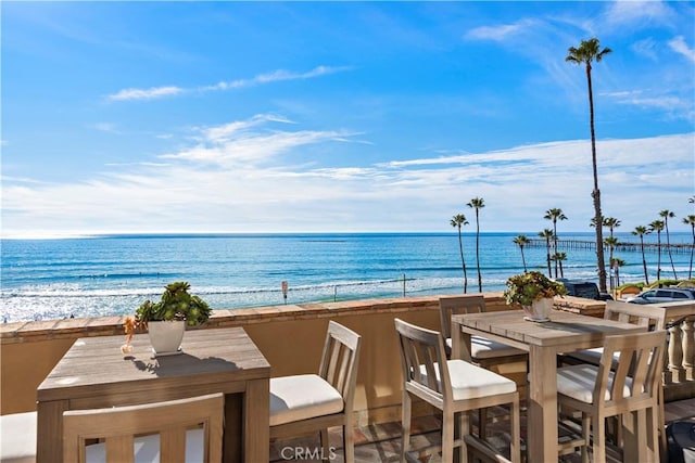 exterior space featuring a beach view