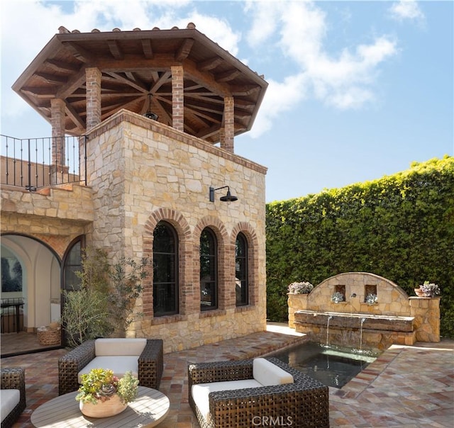 view of patio / terrace featuring an outdoor living space