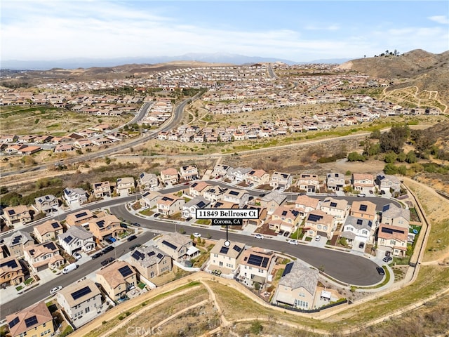 birds eye view of property featuring a residential view and a mountain view