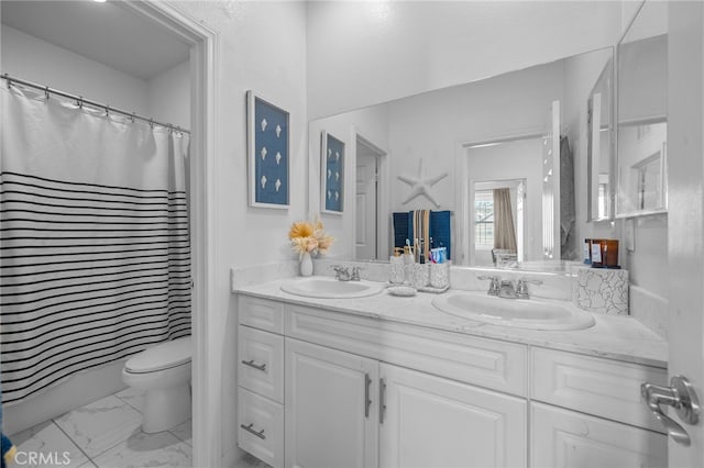 full bathroom featuring marble finish floor, a sink, toilet, and double vanity