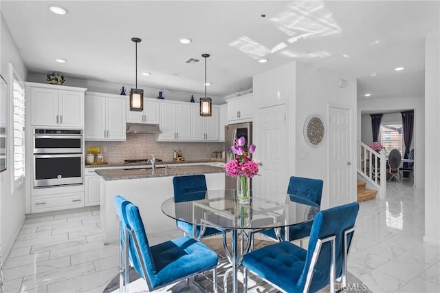 dining room featuring stairs, marble finish floor, visible vents, and recessed lighting