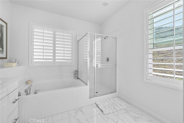 full bath with marble finish floor, vanity, a shower stall, and a bath