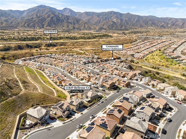 birds eye view of property featuring a residential view and a mountain view