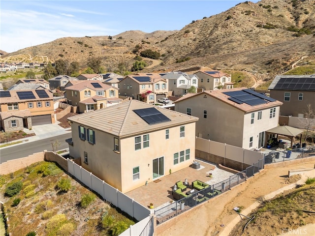 birds eye view of property featuring a residential view and a mountain view