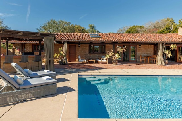 pool featuring a patio