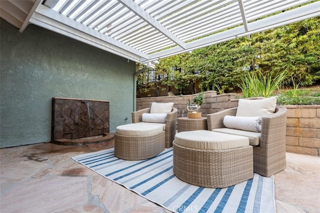 view of patio featuring a pergola