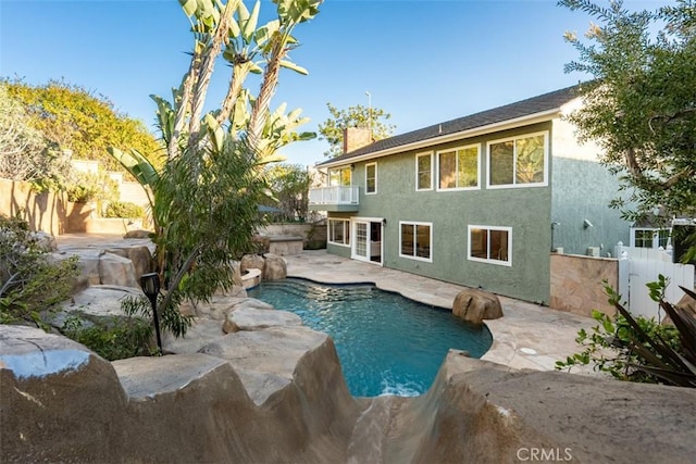 view of swimming pool with a patio, a fenced backyard, and a fenced in pool